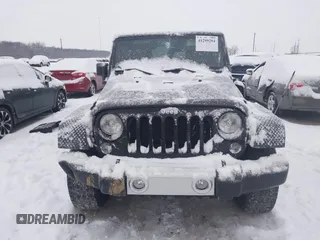 2014 Jeep Wrangler Sahara with VIN 1C4AJWBG3EL190302, listed as a IAAI auction lot 41299284 with 112,476 mi miles and . Bid and sale history available at DreamBid. Image 13.