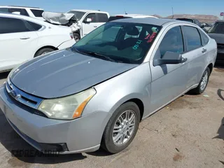 2009 Ford Focus SE z VIN 1FAHP35N99W173410, wystawiony jako IAAI lot #41648274 z przebiegiem 168 767 mil mil oraz . Historia ofert i sprzedaży dostępna na DreamBid. Obrazek 2.