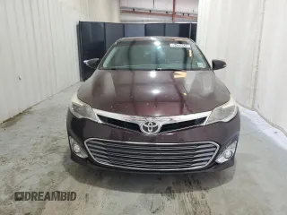 2014 Toyota Avalon Limited z VIN 4T1BK1EB6EU077986, wystawiony jako Copart lot #54209645 z przebiegiem 121 685 mil mil oraz Czysty tytuł • Clean title. Historia ofert i sprzedaży dostępna na DreamBid. Obrazek 5.