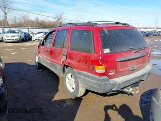 2003 Jeep Grand Cherokee Laredo with VIN 1J4GX48S13C594893, listed as a IAAI auction lot 41688597 with 179,680 mi miles. Bid and sale history available at carsss.com. Image 3.