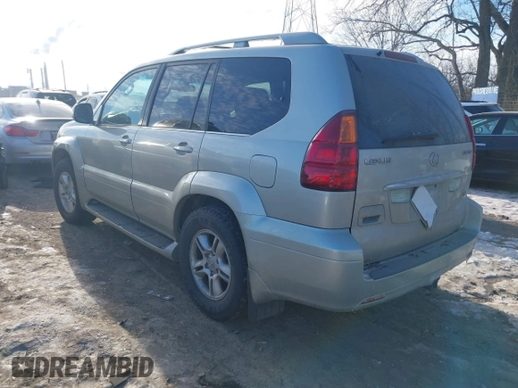 2003 Lexus GX 470 with VIN JTJBT20XX30015034, listed as a IAAI auction lot 41386690 with 234,983 mi miles. Bid and sale history available at carsss.com. Image 3.