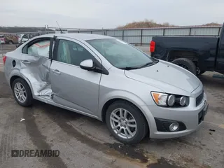 2012 Chevrolet Sonic LT with VIN 1G1JC5SH0C4162034, listed as a IAAI auction lot 41967195 with 87,086 mi miles and . Bid and sale history available at DreamBid. Image 1.