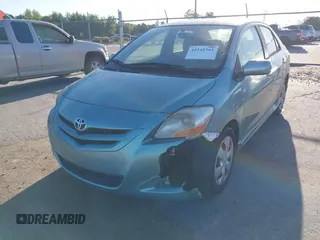 2007 Toyota Yaris with VIN JTDBT923371029654, listed as a IAAI auction lot 42142361 with 296,107 mi miles. Bid and sale history available at carsss.com. Image 14.