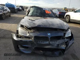 2015 BMW M6 z VIN WBSLX9C52FD160752, wystawiony jako Copart lot #83657994 z przebiegiem Nie podano mil oraz Czysty tytuł • Clean title. Historia ofert i sprzedaży dostępna na DreamBid. Obrazek 5.