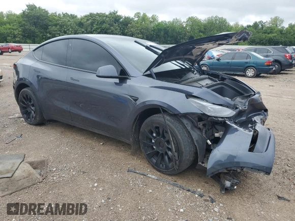 2023 Tesla Model Y Long Range z VIN 7SAYGDEE4PF752292, wystawiony jako Copart lot #53824185 z przebiegiem 61 470 mil mil oraz Szkoda całkowita • Salvage title. Historia ofert i sprzedaży dostępna na DreamBid. Obrazek 4.