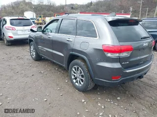 2014 Jeep Grand Cherokee Limited with VIN 1C4RJFBG8EC540896, listed as a IAAI auction lot 41921568 with 71,033 mi miles. Bid and sale history available at carsss.com. Image 3.