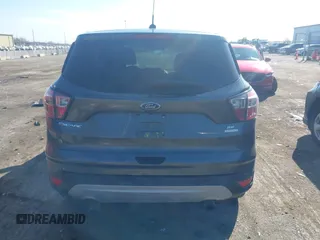 2017 Ford Escape SE with VIN 1FMCU0GD0HUB80123, listed as a IAAI auction lot 41895514 with 61,680 mi miles and . Bid and sale history available at DreamBid. Image 16.