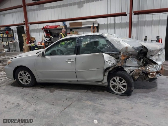 2004 Toyota Camry LE with VIN 4T1BF32K74U568974, listed as a IAAI auction lot 41590644 with 129,461 mi miles. Bid and sale history available at carsss.com. Image 14.