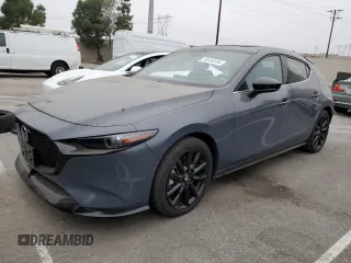 2023 Mazda 3 Premium Plus with VIN JM1BPBNY0P1605400, listed as a Copart auction lot 76144514 with 2,199 mi miles and Salvage title. Bid and sale history available at DreamBid. Image 1.
