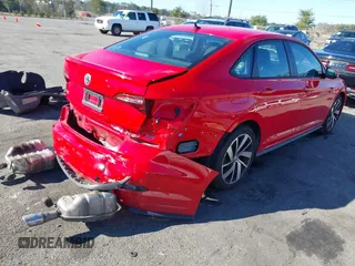 2019 Volkswagen Jetta GLI S z VIN 3VW5T7BU3KM225015, wystawiony jako IAAI lot #41352228 z przebiegiem 96 874 mil mil oraz . Historia ofert i sprzedaży dostępna na DreamBid. Obrazek 4.