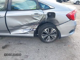 2017 Honda Civic EX-T with VIN 19XFC1F39HE001756, listed as a IAAI auction lot 42030331 with 44,056 mi miles. Bid and sale history available at carsss.com. Image 6.
