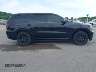 2018 Dodge Durango GT with VIN 1C4RDJDG7JC115655, listed as a IAAI auction lot 39537573 with 119,801 mi miles and . Bid and sale history available at DreamBid. Image 13.