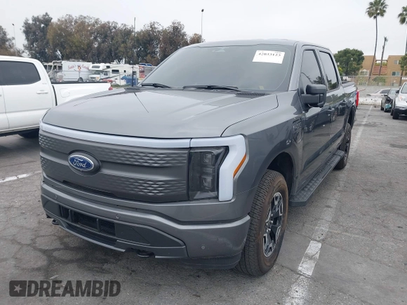 2023 Ford F-150 Lightning Pro with VIN 1FTVW1EL8PWG48559, listed as a IAAI auction lot 42033123 with 8,845 mi miles and . Bid and sale history available at DreamBid. Image 2.