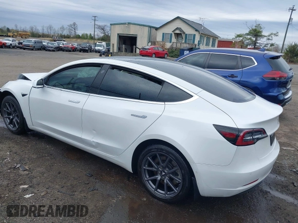 2019 Tesla Model 3 Mid Range with VIN 5YJ3E1EA5KF397098, listed as a IAAI auction lot 41943570 with 72,046 mi miles and . Bid and sale history available at DreamBid. Image 3.