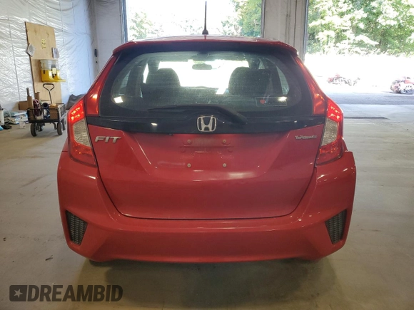 2015 Honda Fit LX with VIN 3HGGK5G55FM780043, listed as a Copart auction lot 69003154 with 141,424 mi miles and Salvage Title. Bid and sale history available at carsss.com. Image 6.