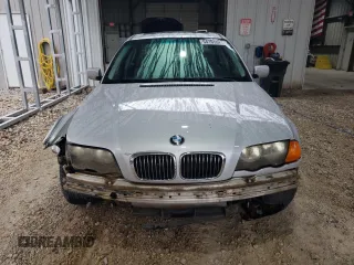 2000 BMW 3 Series 323i with VIN WBAAM3348YFP73443, listed as a Copart auction lot 54165575 with 334,761 mi miles and Salvage title. Bid and sale history available at DreamBid. Image 5.