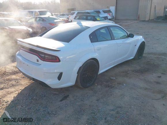 2020 Dodge Charger Scat Pack with VIN 2C3CDXGJ1LH217683, listed as a IAAI auction lot 41656722 with 70,758 mi miles. Bid and sale history available at carsss.com. Image 4.