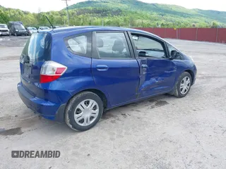 2009 Honda Fit with VIN JHMGE882X9S058976, listed as a IAAI auction lot 42202305 with 121,633 mi miles and . Bid and sale history available at DreamBid. Image 4.