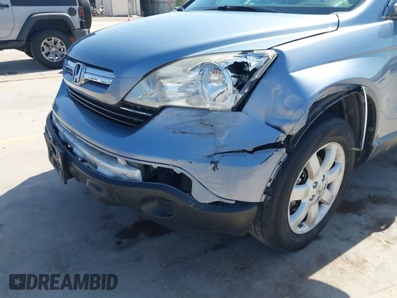 2009 Honda CR-V EX-L with VIN JHLRE38719C001393, listed as a IAAI auction lot 41884431 with 186,677 mi miles and . Bid and sale history available at carsss.com. Image 6.