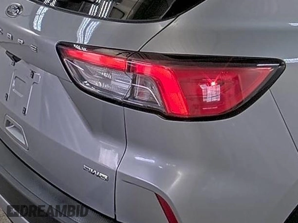2022 Ford Escape SE z VIN 1FMCU9G66NUB33504, wystawiony jako IAAI lot #42748133 z przebiegiem 74 338 mil mil oraz . Historia ofert i sprzedaży dostępna na DreamBid. Obrazek 28.