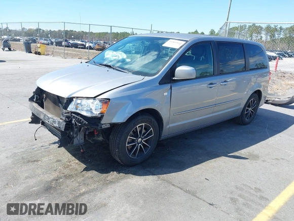 2014 Dodge Grand Caravan SXT with VIN 2C4RDGCGXER261467, listed as a IAAI auction lot 41801810 with 97,322 mi miles and . Bid and sale history available at DreamBid. Image 2.