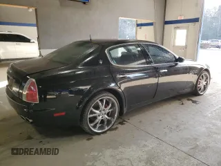 2005 Maserati Quattroporte z VIN ZAMCE39A050015127, wystawiony jako Copart lot #85957714 z przebiegiem 88 278 mil mil oraz Czysty tytuł • Clean title. Historia ofert i sprzedaży dostępna na DreamBid. Obrazek 3.
