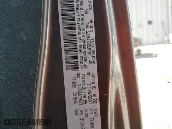 2016 Jeep Wrangler Unlimited Rubicon with VIN 1C4BJWFG8GL192077, listed as a Copart auction lot 58339005 with 62,076 mi miles and Salvage title. Bid and sale history available at DreamBid. Image 14.
