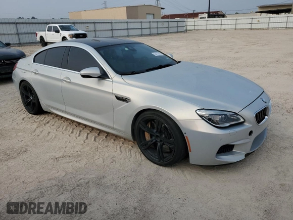 2017 BMW M6 z VIN WBS6E9C56HG437374, wystawiony jako Copart lot #54277624 z przebiegiem 80 858 mil mil oraz . Historia ofert i sprzedaży dostępna na DreamBid. Obrazek 4.