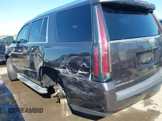 2015 Cadillac Escalade Luxury z VIN 1GYS3MKJ2FR518865, wystawiony jako IAAI lot #41890235 z przebiegiem 156 849 mil mil oraz . Historia ofert i sprzedaży dostępna na DreamBid. Obrazek 6.