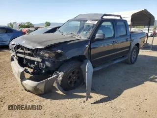 2002 Nissan Frontier SE z VIN 1N6ED27T92C366849, wystawiony jako Copart lot #52940225 z przebiegiem 199 643 mil mil oraz Szkoda całkowita • Salvage title. Historia ofert i sprzedaży dostępna na DreamBid. Obrazek 1.