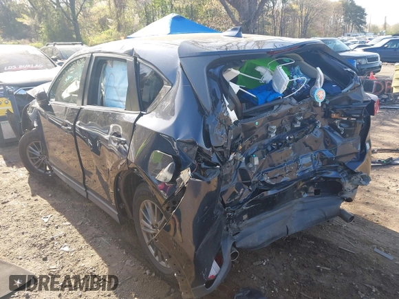 2019 Mazda CX-5 Touring with VIN JM3KFBCM6K0513037, listed as a IAAI auction lot 42121789 with 59,455 mi miles and . Bid and sale history available at DreamBid. Image 3.