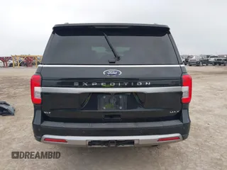 2022 Ford Expedition Max XLT z VIN 1FMJK1HTXNEA66466, wystawiony jako IAAI lot #41933676 z przebiegiem 78 556 mil mil oraz . Historia ofert i sprzedaży dostępna na DreamBid. Obrazek 17.