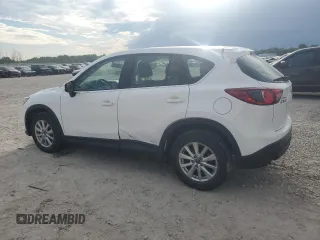 2016 Mazda CX-5 Sport with VIN JM3KE2BY0G0729349, listed as a Copart auction lot 62469735 with 88,247 mi miles and Salvage title. Bid and sale history available at DreamBid. Image 2.
