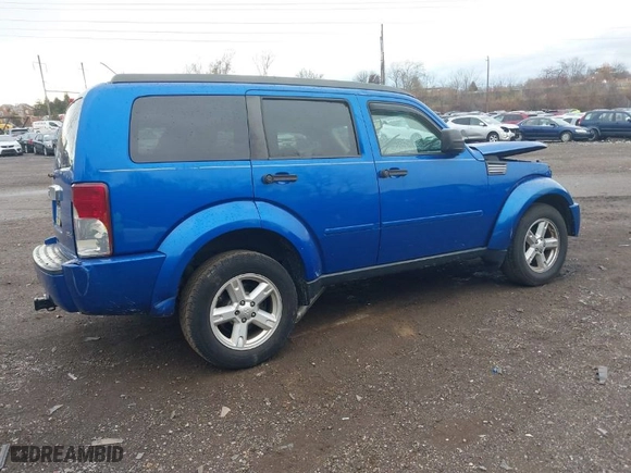 2007 Dodge Nitro SLT with VIN 1D8GU58K97W560212, listed as a IAAI auction lot 41018041 with 1 mi miles. Bid and sale history available at carsss.com. Image 4.