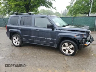 2014 Jeep Patriot Latitude with VIN 1C4NJPFA1ED651021, listed as a Copart auction lot 56947445 with 137,239 mi miles and Salvage title. Bid and sale history available at DreamBid. Image 4.