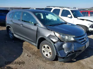 2014 Honda CR-V LX with VIN 2HKRM4H39EH634676, listed as a IAAI auction lot 41233279 with 153,761 mi miles and . Bid and sale history available at carsss.com. Image 1.
