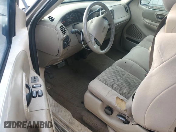 2003 Ford F-150 XL with VIN 1FTRX17LX3NA38576, listed as a Copart auction lot 54057495 with 173,811 mi miles and Salvage title. Bid and sale history available at DreamBid. Image 8.