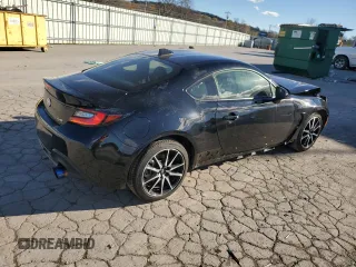 2023 Toyota GR86 with VIN JF1ZNBB12P9763031, listed as a Copart auction lot 81593314 with 7,411 mi miles and Salvage Title. Bid and sale history available at carsss.com. Image 3.