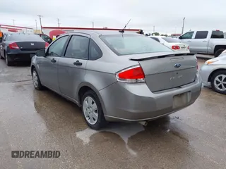 2008 Ford Focus S with VIN 1FAHP34N98W279940, listed as a IAAI auction lot 41950732 with 145,562 mi miles. Bid and sale history available at carsss.com. Image 3.
