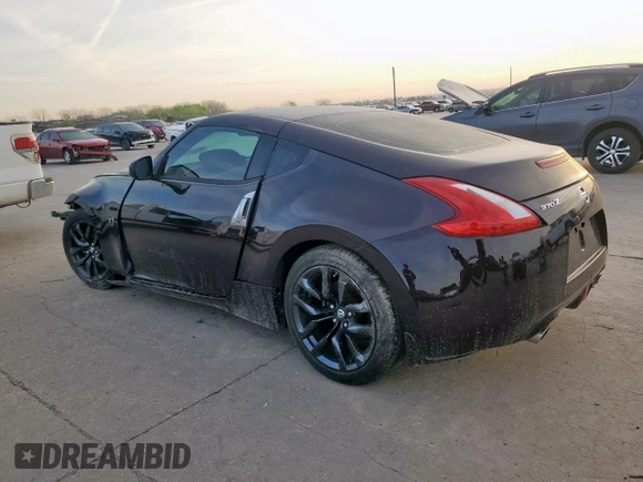 2015 Nissan 370Z with VIN JN1AZ4EH1FM442502, listed as a Copart auction lot 48332035 with 101,462 mi miles and Salvage Title. Bid and sale history available at carsss.com. Image 2.