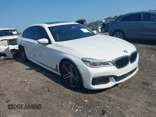 2016 BMW 7 Series 750i with VIN WBA7F0C52GGL99450, listed as a IAAI auction lot 42554664 with 114,257 mi miles and . Bid and sale history available at DreamBid. Image 1.