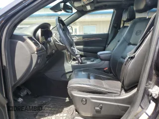 2016 Jeep Grand Cherokee Overland with VIN 1C4RJFCG9GC338165, listed as a Copart auction lot 54125815 with 102,302 mi miles and Salvage title. Bid and sale history available at DreamBid. Image 7.