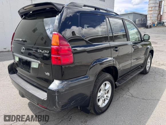 2005 Lexus GX 470 with VIN JTJBT20X050079831, listed as a Copart auction lot 56405105 with 390,415 mi miles and Clean Title. Bid and sale history available at DreamBid. Image 4.