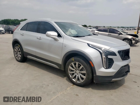 2021 Cadillac XT4 FWD Premium Luxury z VIN 1GYFZCR42MF004233, wystawiony jako Copart lot #57229385 z przebiegiem 98 387 mil mil oraz Szkody całkowita. Historia ofert i sprzedaży dostępna na DreamBid. Obrazek 4.