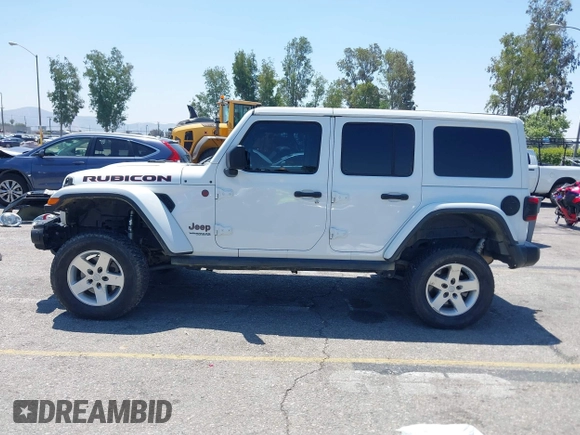 2018 Jeep Wrangler Unlimited Rubicon with VIN 1C4HJXFN8JW215023, listed as a IAAI auction lot 42227099 with 62,195 mi miles and . Bid and sale history available at DreamBid. Image 14.
