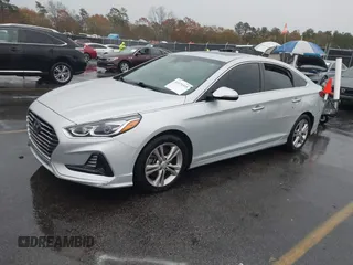 2018 Hyundai Sonata SEL with VIN 5NPE34AF0JH696872, listed as a IAAI auction lot 41070305 with 121,000 mi miles and . Bid and sale history available at DreamBid. Image 2.