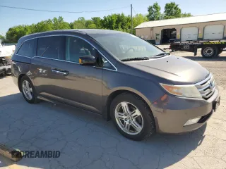2011 Honda Odyssey Touring с VIN 5FNRL5H94BB078137, выставлен на аукционе Copart как лот 57467505 с пробегом 210 405 миль миль и Списание • Salvage title. История ставок и продаж доступна на DreamBid. Изображение 4.