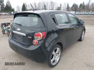 2016 Chevrolet Sonic LTZ z VIN 1G1JE6SB3G4149439, wystawiony jako IAAI lot #41648101 z przebiegiem 114 902 mil mil oraz . Historia ofert i sprzedaży dostępna na DreamBid. Obrazek 4.