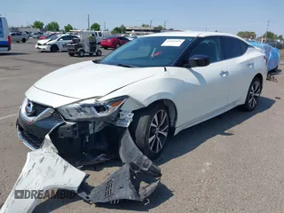 2017 Nissan Maxima SL with VIN 1N4AA6AP1HC409561, listed as a IAAI auction lot 42452859 with 107,640 mi miles and . Bid and sale history available at DreamBid. Image 2.