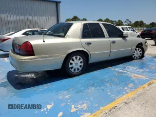 2005 Mercury Grand Marquis LS Premium z VIN 2MEFM75W45X636559, wystawiony jako Copart lot #54424415 z przebiegiem 129 643 mil mil oraz Szkoda całkowita • Salvage title. Historia ofert i sprzedaży dostępna na DreamBid. Obrazek 3.